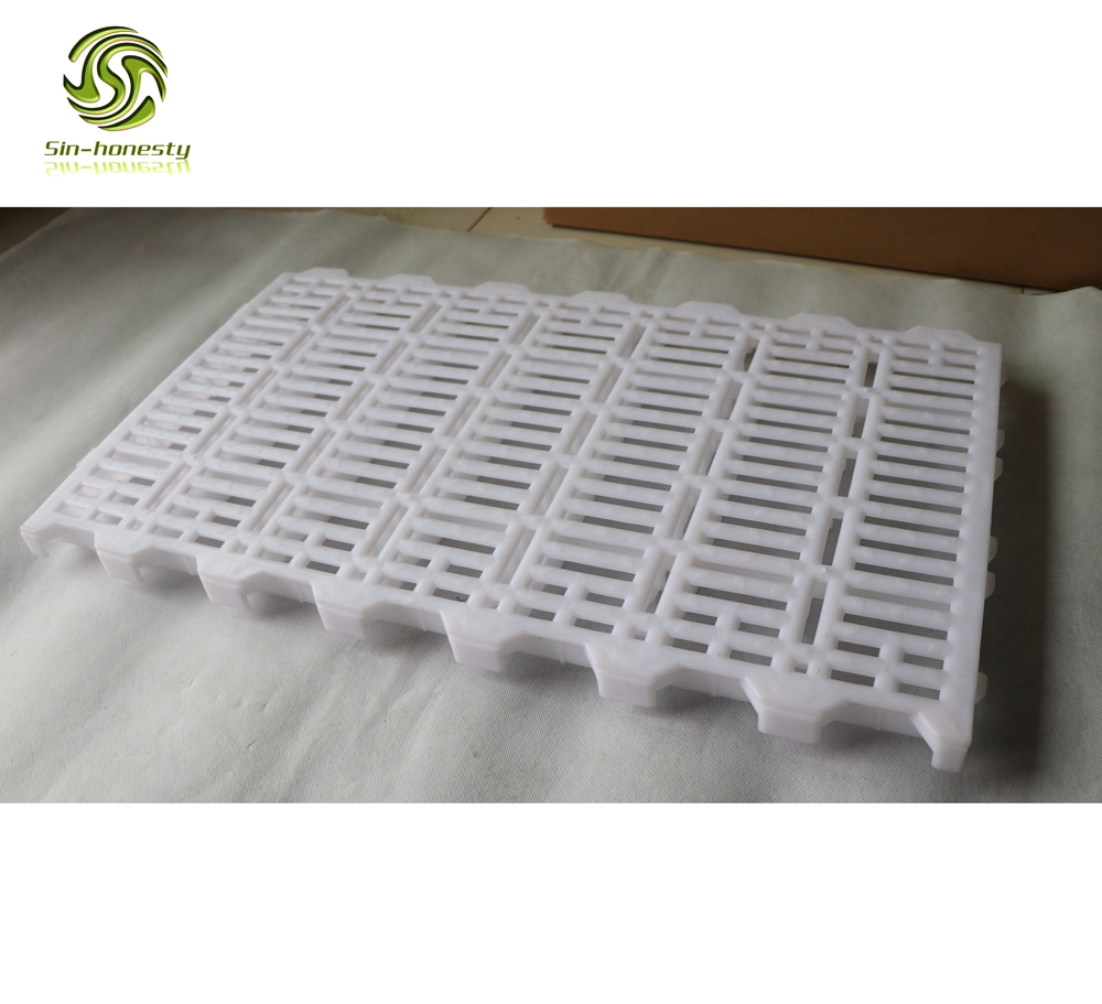 Plastic slatted floor for pigs